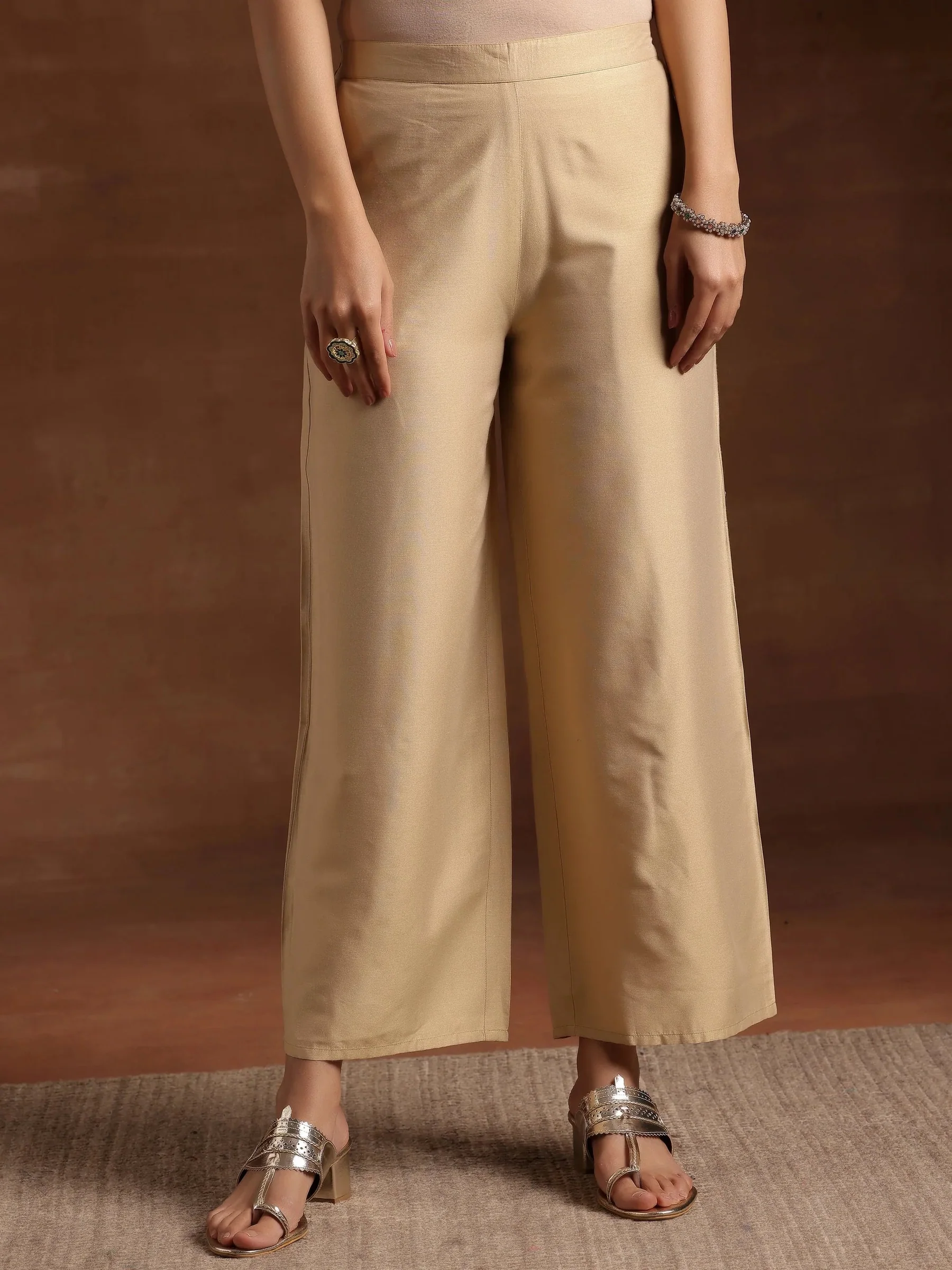 beige solid silk palazzos beige solid silk palazzos