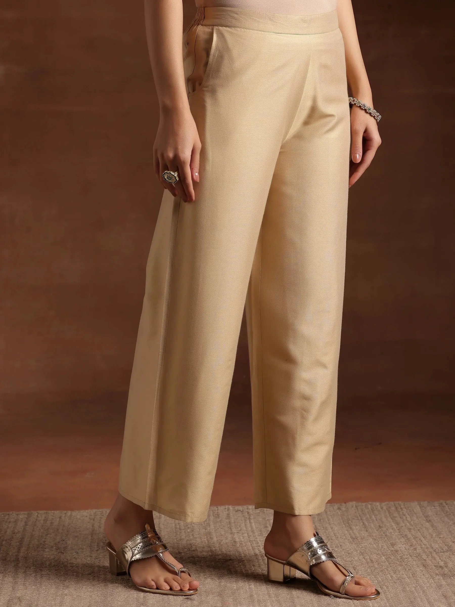 beige solid silk palazzos beige solid silk palazzos