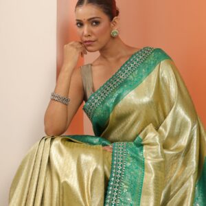 green woven design banarasi silk blend saree with unstitched blouse piece